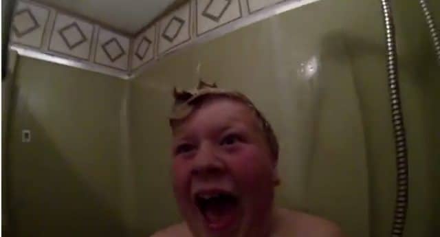 Dad Terrifies Son with Shower Prank