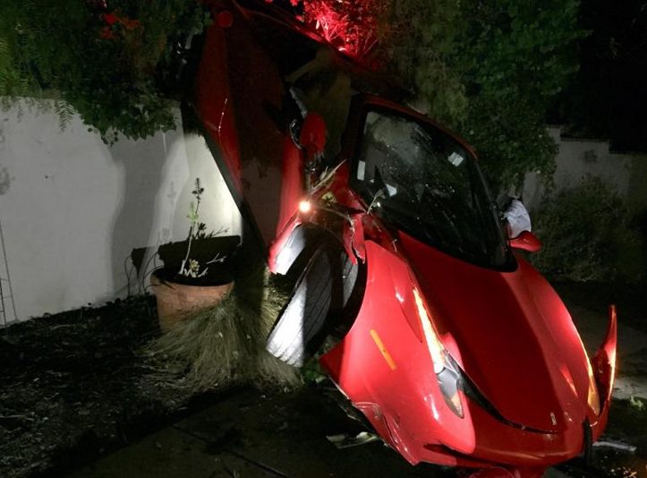 A driver in Rancho Santa Fe Crashed a $300,000 Ferrari in to a back yard and left it behind