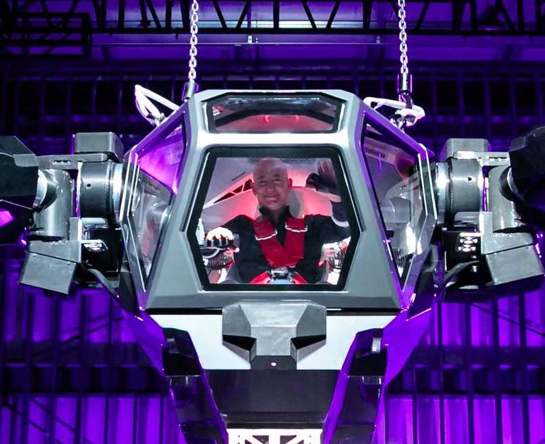 Amazon S Jeff Bezos Was In Palm Springs Piloting A Gigantic Robot Suit Cactus Hugs