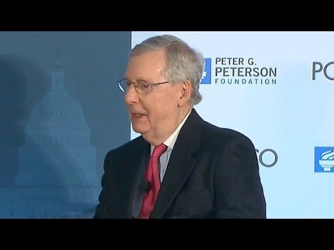 Mitch McConnell laughs when asked if Mexico is going to pay for Trump’s wall