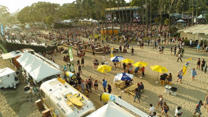 A stage is set up on the beach for the Ohana music festival