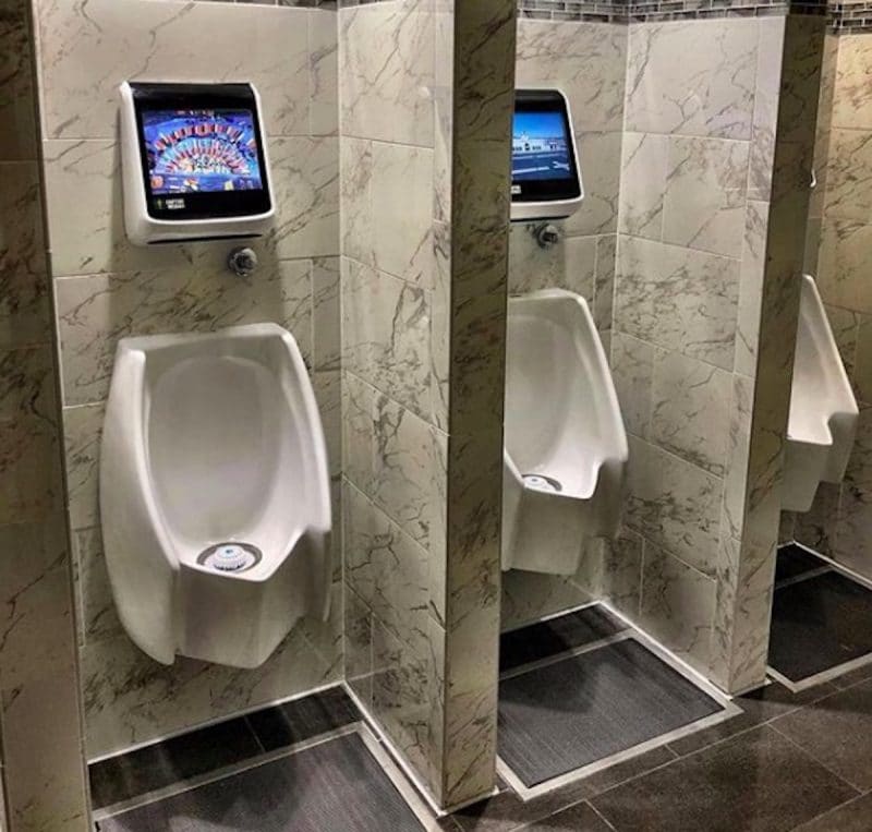 The urinals have games to play while you pee at Eddie World in Yermo