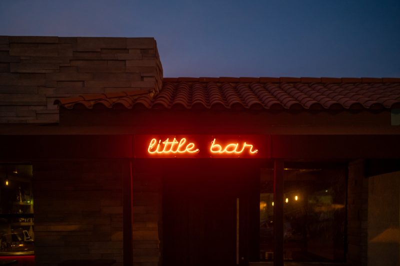 A small neon sign for Little Bar in Palm Desert